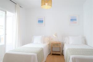 Postel nebo postele na pokoji v ubytování Hostal La Calzada