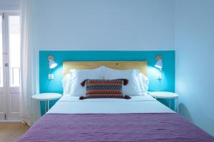 Postel nebo postele na pokoji v ubytování Hostal La Calzada