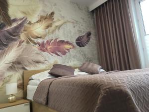 Posteľ alebo postele v izbe v ubytovaní Apartament S&S Nadmorskie Tarasy Kołobrzeg D302