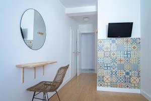 TV a/nebo společenská místnost v ubytování Hostal La Calzada + 17 fotografií