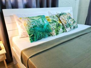 a bed with two pillows on top of it at Matilde’s Sanctuary Bed & Breakfast in Dampol