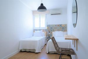 Postel nebo postele na pokoji v ubytování Hostal La Calzada