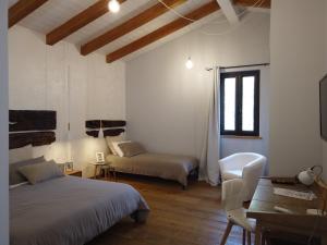 Tempat tidur dalam kamar di Il Mandorlo
