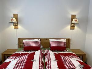 מיטה או מיטות בחדר ב-Naturnoech