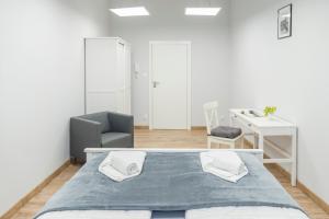 Posteľ alebo postele v izbe v ubytovaní Apartament pod Twierdzą + 37 fotografií