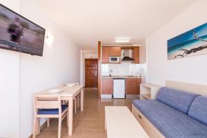 Kuchyňa alebo kuchynka v ubytovaní Bossa Bay - MC Apartments Ibiza