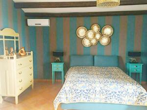 Posteľ alebo postele v izbe v ubytovaní La stanza delle Muse in Villa con Piscina