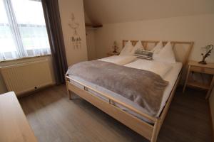 Llit o llits en una habitació de Appartements Panorama Schlössl