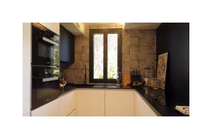 Телевизор и/или развлекательный центр в Appartement Villa Cassis