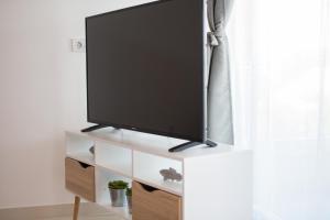TV a/nebo společenská místnost v ubytování Dodo Apartments