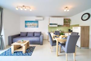 Kuchyň nebo kuchyňský kout v ubytování Dodo Apartments
