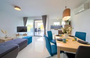 TV a/nebo společenská místnost v ubytování Dodo Apartments