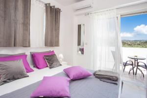 Posteľ alebo postele v izbe v ubytovaní La Casa Del Amor
