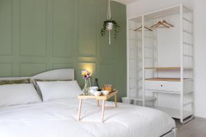 A bed or beds in a room at ReGenzio