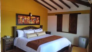 Postel nebo postele na pokoji v ubytování Hotel Las Rocas Resort Villanueva