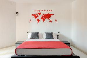 A bed or beds in a room at Casa Lu Maccu - Sea View Apartment