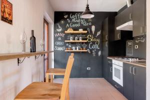 A kitchen or kitchenette at Casa Lu Maccu - Sea View Apartment Még 16 kép