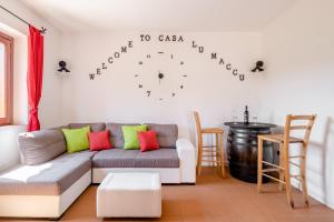 A seating area at Casa Lu Maccu - Sea View Apartment
