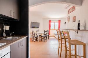 A kitchen or kitchenette at Casa Lu Maccu - Sea View Apartment