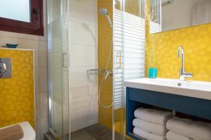 a bathroom with a sink and a shower at Nikolas Guest House Villa in Nikiana +34 photos