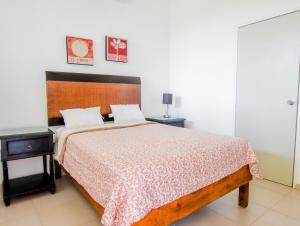Кровать или кровати в номере Casa Bakab By Rotamundos