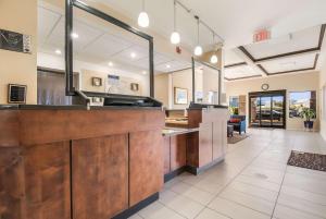 a large kitchen with a large counter top and a counter top at Comfort Inn in Newport