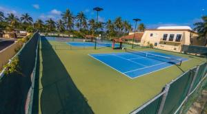 a tennis court with two tennis courts at Velas Vallarta Condo in Puerto Vallarta