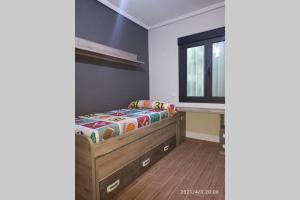 Postel nebo postele na pokoji v ubytování Apartamento reformado 1º + 9 fotografií