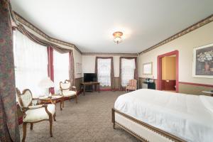 Postel nebo postele na pokoji v ubytování Naples Hotel