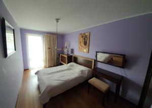 Postel nebo postele na pokoji v ubytování Aquarius-Aqua Apartment