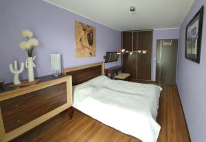 Postel nebo postele na pokoji v ubytování Aquarius-Aqua Apartment