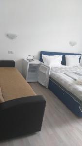 Postel nebo postele na pokoji v ubytování Sofial Guesthouse