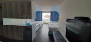 A television and/or entertainment centre at SKY square Homestay