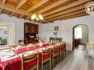 a large dining room with a long table with chairs at Gîte Saint-Didier-sur-Rochefort, 7 pièces, 12 personnes - FR-1-496-18 in Saint-Didier-sur-Rochefort