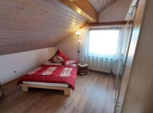 Ferienwohnung Berglen-Domizil tesisinde bir odada yatak veya yataklar