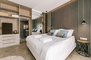 Posteľ alebo postele v izbe v ubytovaní M Mansion + 37 fotografií