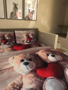 A bed or beds in a room at Sweet home