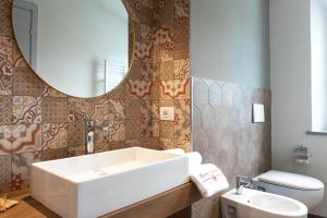 Et badeværelse på Monna Caterina Wine Resort