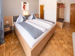 Postel nebo postele na pokoji v ubytování Gästehaus Genf
