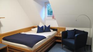 Postel nebo postele na pokoji v ubytování Hotel Anlage Heidelberg