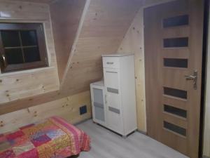 Postel nebo postele na pokoji v ubytování Domek Letniskowy - M & E