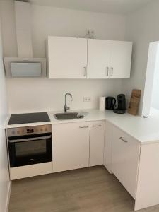 Η κουζίνα ή μικρή κουζίνα στο Zentrale und schöne Ferienwohnung