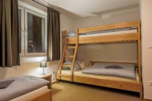 Posteľ alebo postele v izbe v ubytovaní Chalet Zuberec