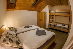 Posteľ alebo postele v izbe v ubytovaní Chalet Zuberec