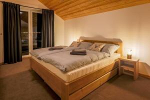 Posteľ alebo postele v izbe v ubytovaní Chalet Zuberec