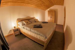 Säng eller sängar i ett rum på Chalet Zuberec