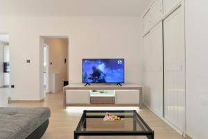 TV a/nebo společenská místnost v ubytování House Pula 2080