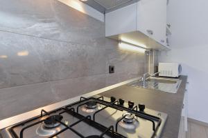 Kuchyň nebo kuchyňský kout v ubytování House Pula 2080
