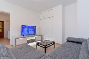 TV a/nebo společenská místnost v ubytování House Pula 2080