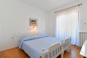 Postel nebo postele na pokoji v ubytování House Pula 2080